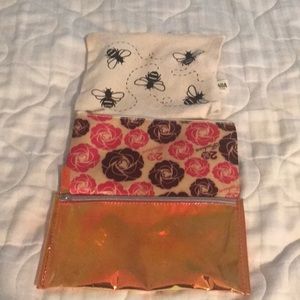 A bundle of 3 makeup bags